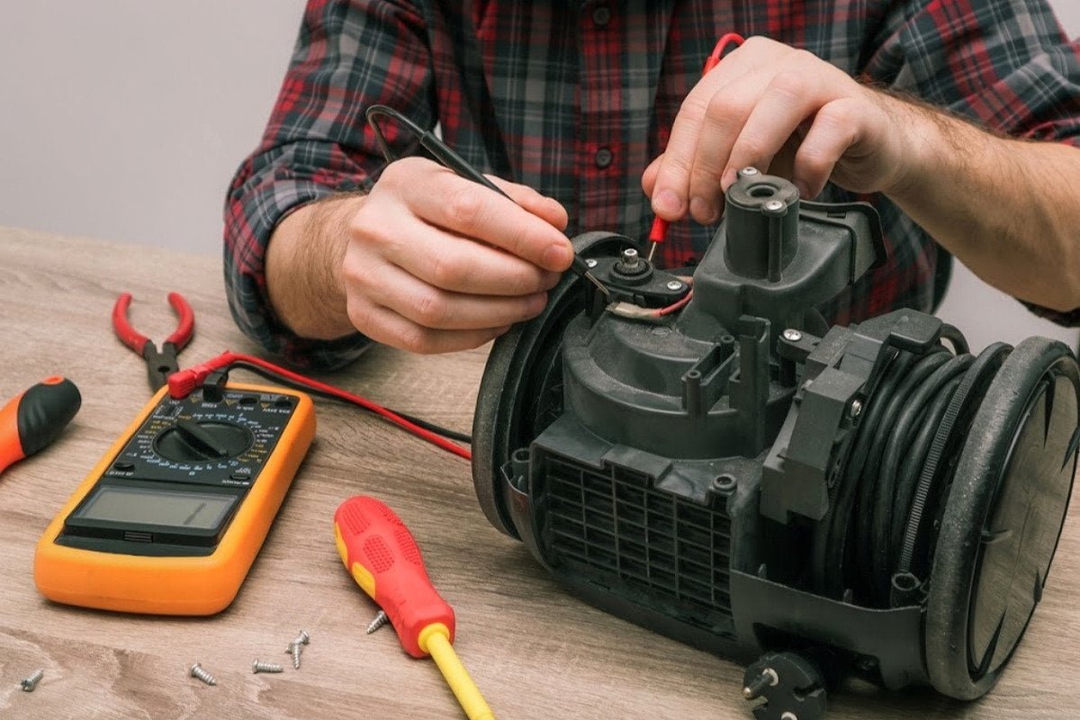 Vacuum cleaner repair warning signs including weak suction noise and overheating